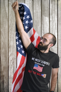 WE NEED LEADERS to kiss the FLAG not the wall  T-Shirt