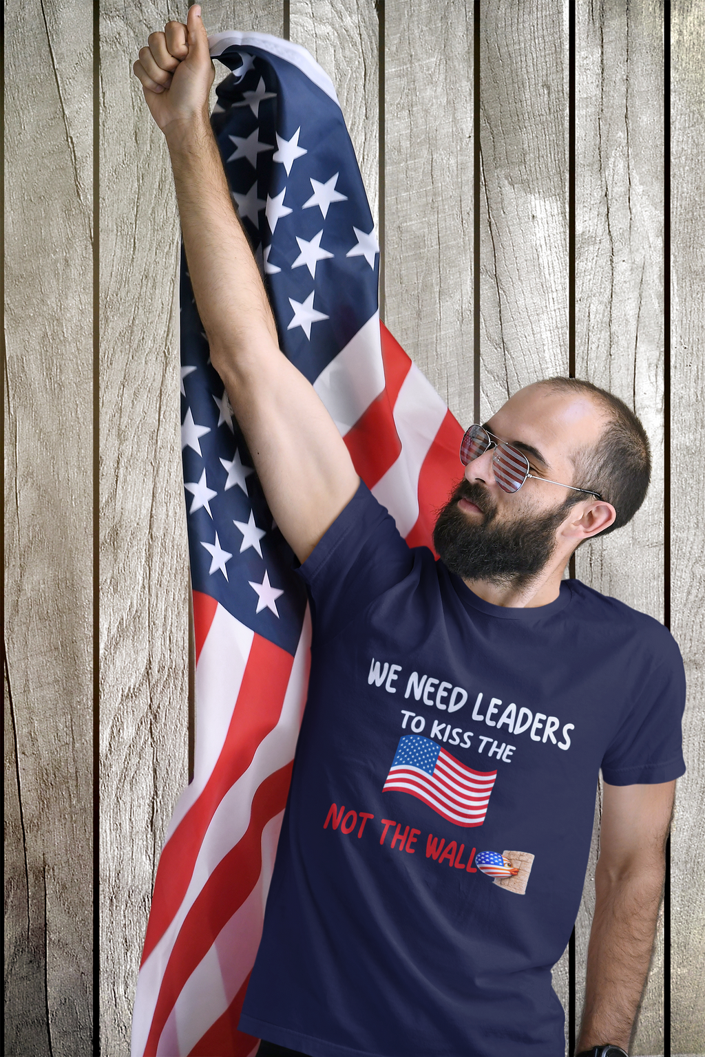 WE NEED LEADERS to kiss the FLAG not the wall  T-Shirt